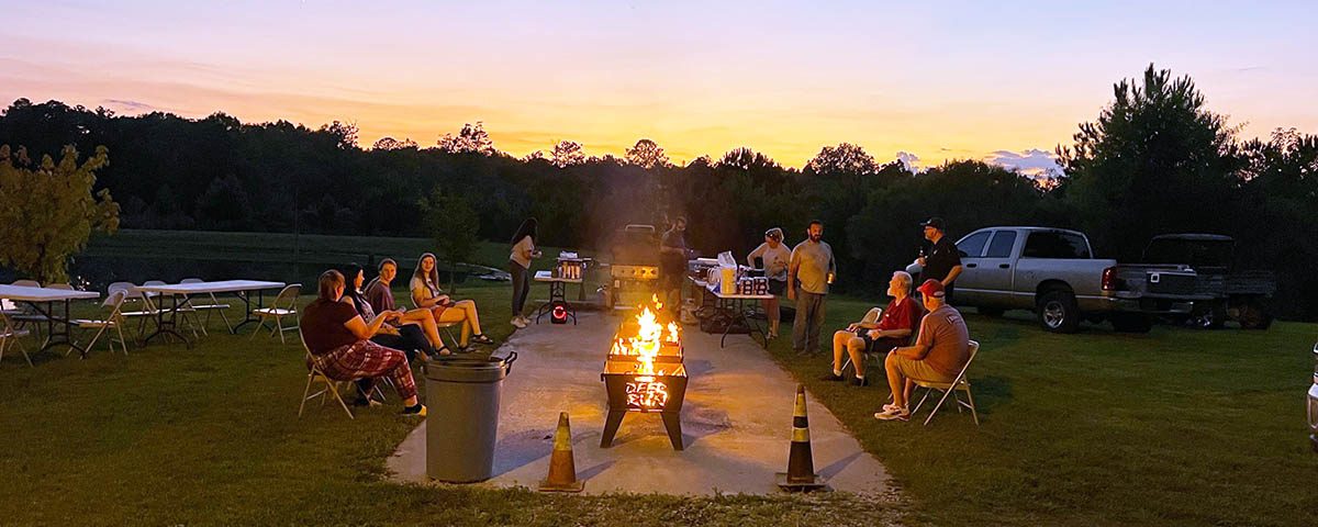 Families enjoying a Memorial Day campfire gathering at Deer Run RV Park in Troy, Alabama
