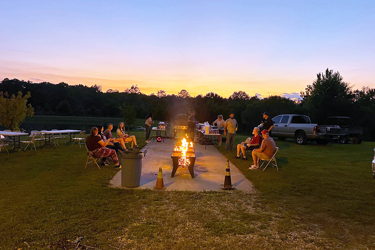 Families enjoying a Memorial Day campfire gathering at Deer Run RV Park in Troy, Alabama