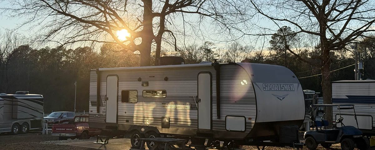 Travel trailer campsite during a late summer afternoon at Deer Run RV Park in Troy, Alabama