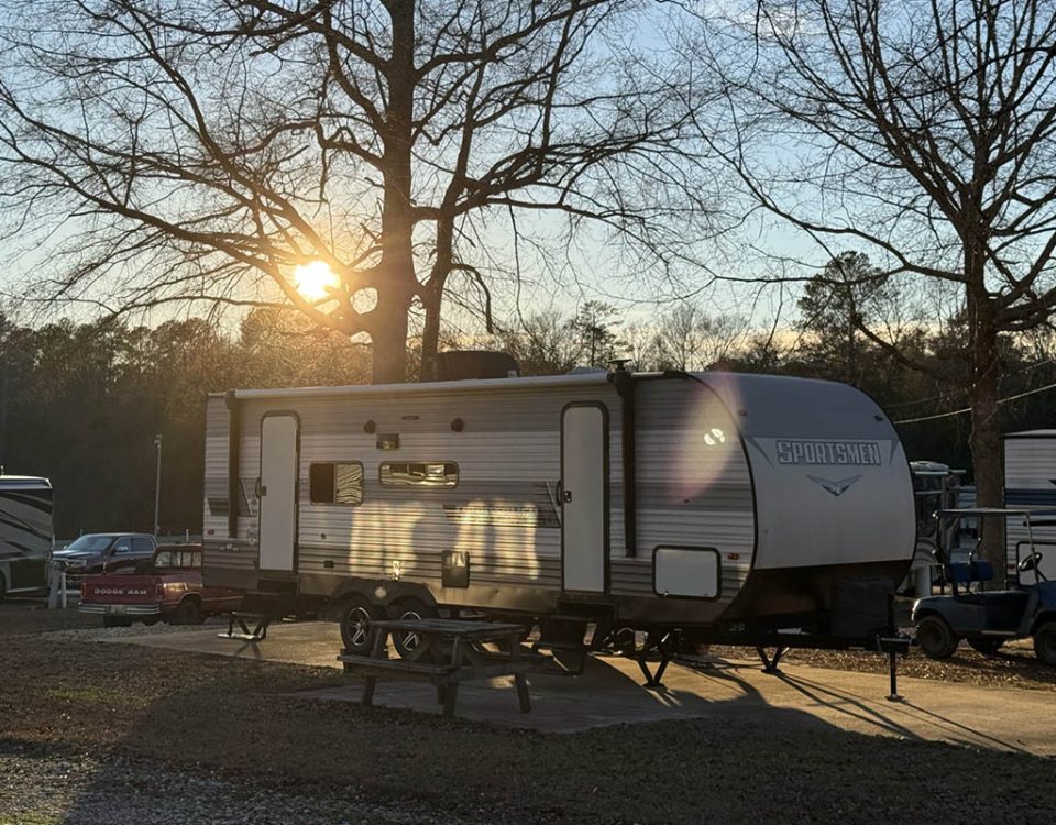 Travel trailer campsite during a late summer afternoon at Deer Run RV Park in Troy, Alabama