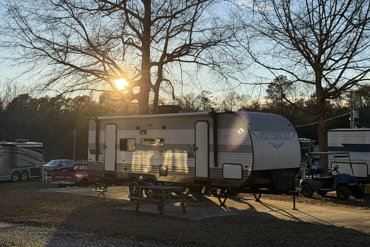 Travel trailer campsite during a late summer afternoon at Deer Run RV Park in Troy, Alabama
