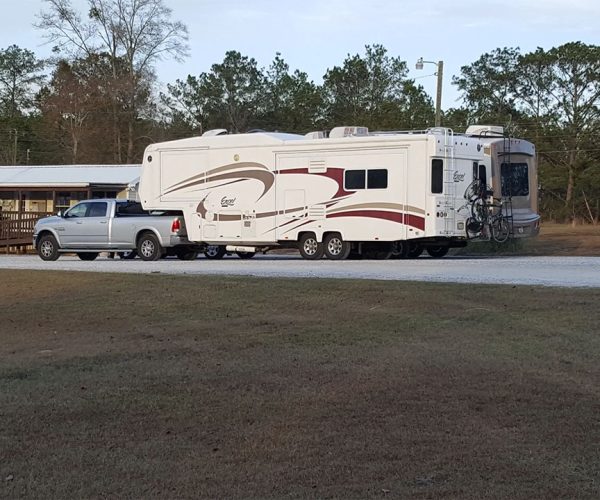 RV Site at Deer Run RV Park – Troy, Alabama Large RV on a spacious RV site at Deer Run RV Park in Troy, Alabama